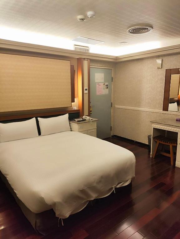Postel nebo postele na pokoji v ubytování GAWA Hotel