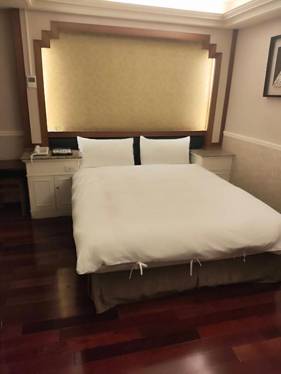 Postel nebo postele na pokoji v ubytování GAWA Hotel