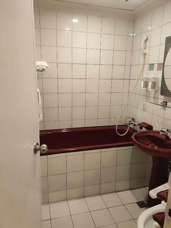 Koupelna v ubytování GAWA Hotel