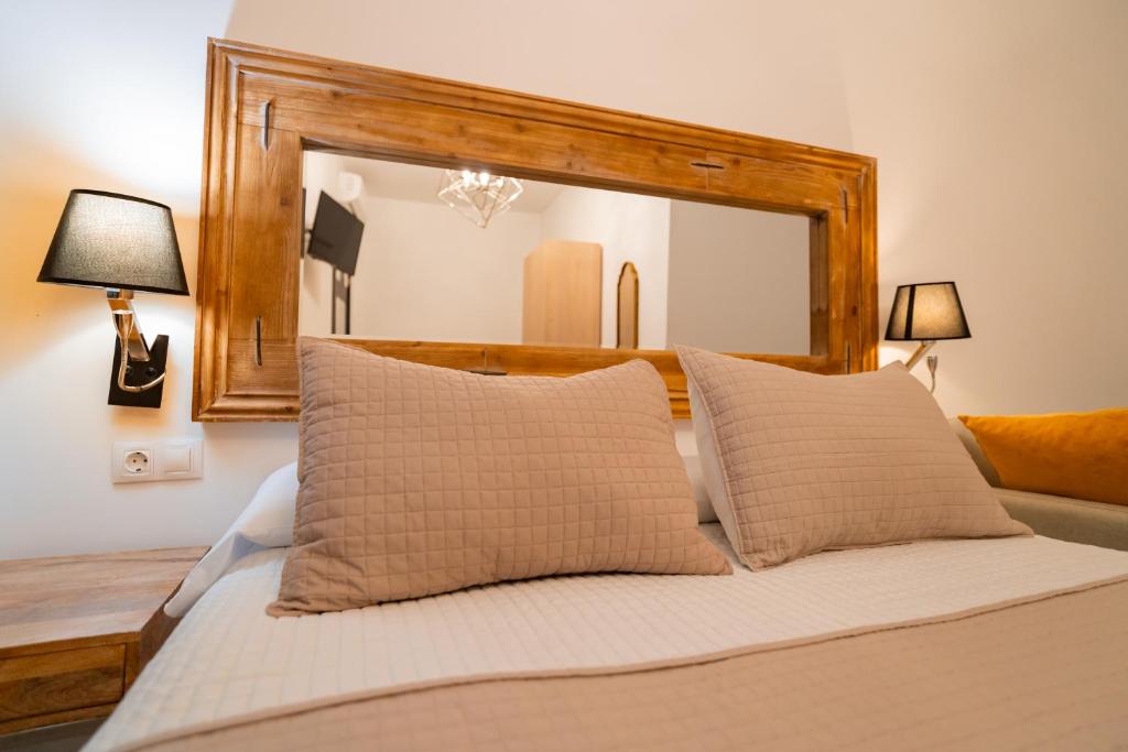 Posteľ alebo postele v izbe v ubytovaní Center Suites San Eloy