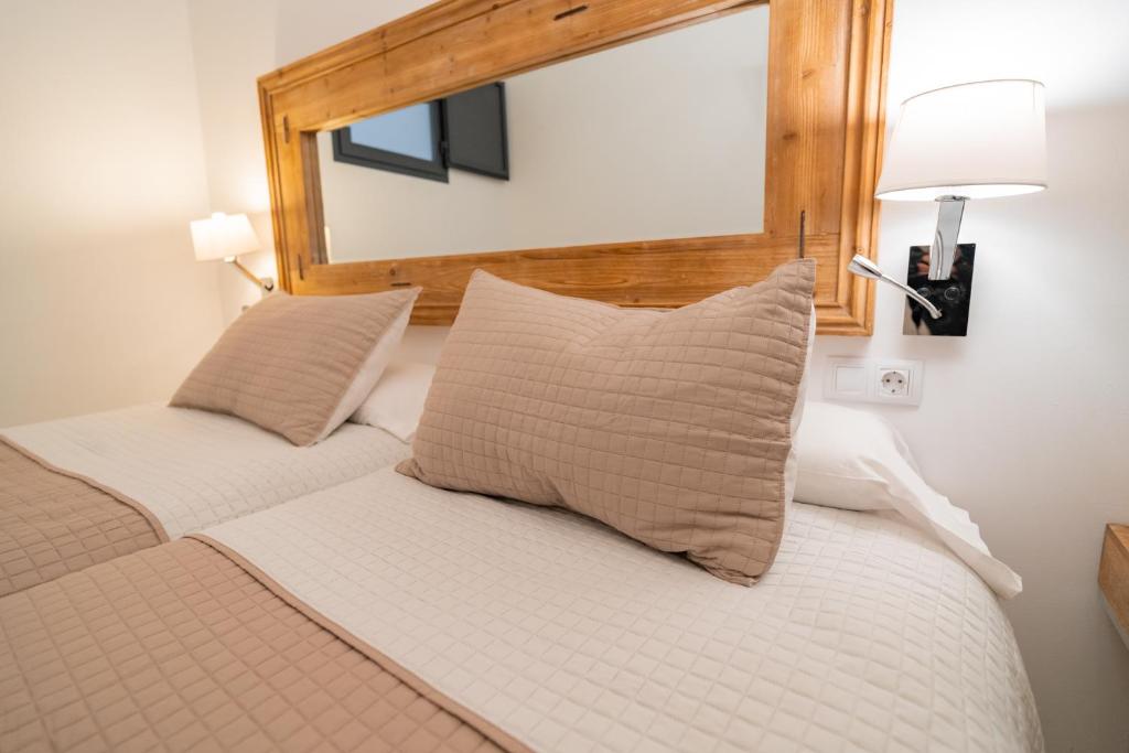 Posteľ alebo postele v izbe v ubytovaní Center Suites San Eloy