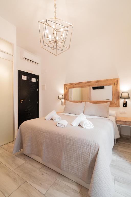 Posteľ alebo postele v izbe v ubytovaní Center Suites San Eloy