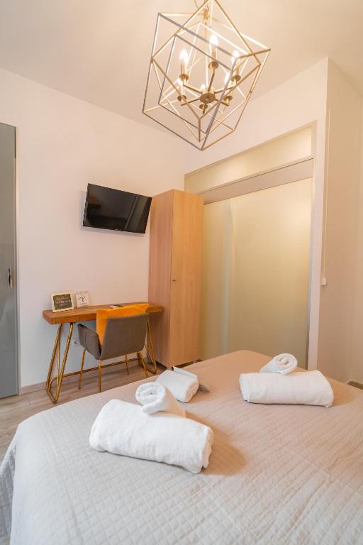 Posteľ alebo postele v izbe v ubytovaní Center Suites San Eloy