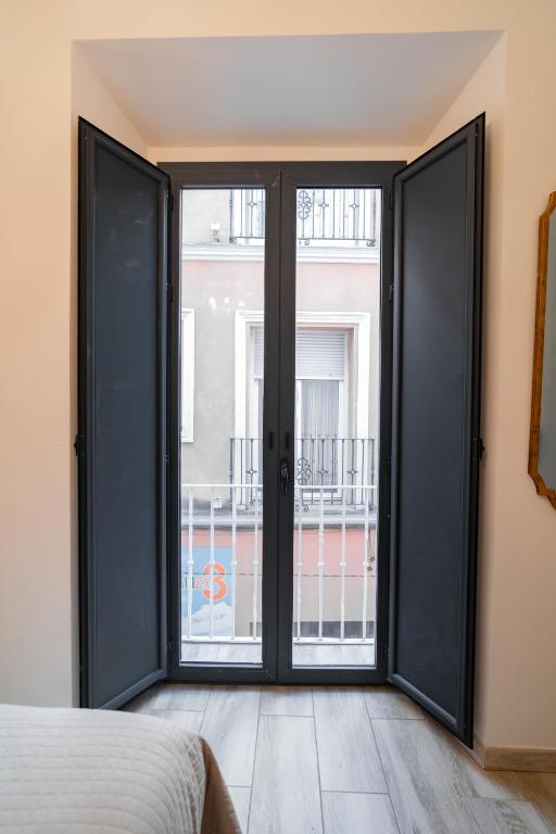 Posteľ alebo postele v izbe v ubytovaní Center Suites San Eloy