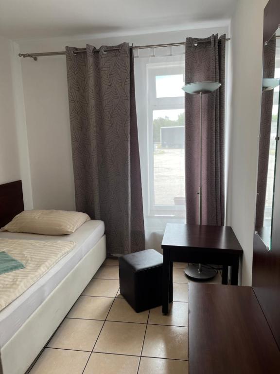 Posteľ alebo postele v izbe v ubytovaní Motel w Łące