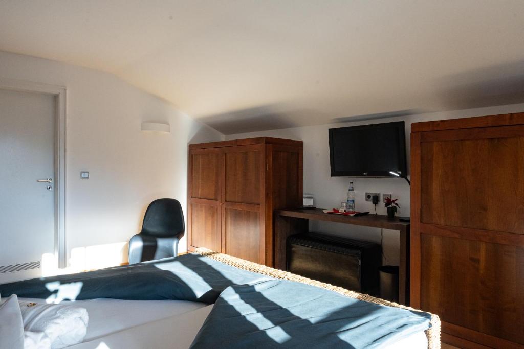 Postel nebo postele na pokoji v ubytování Nebelhorn Relaxhotel