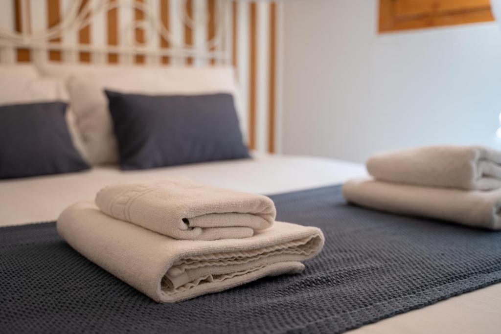 Posteľ alebo postele v izbe v ubytovaní La casita de Real de Cartuja - Apartamento Deluxe opción parking