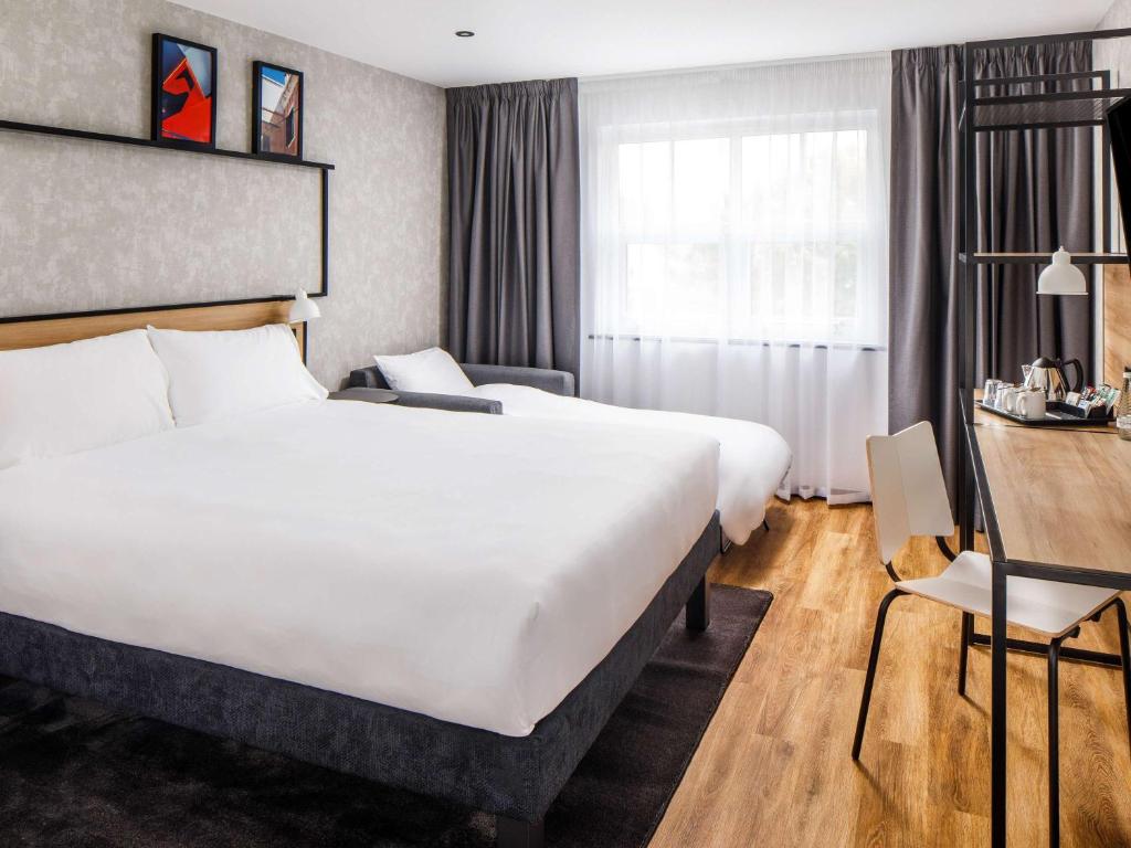 Postel nebo postele na pokoji v ubytování ibis Wakefield East-Castleford