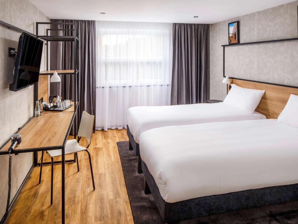 Postel nebo postele na pokoji v ubytování ibis Wakefield East-Castleford