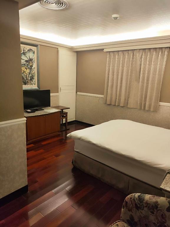 TV a/nebo společenská místnost v ubytování GAWA Hotel