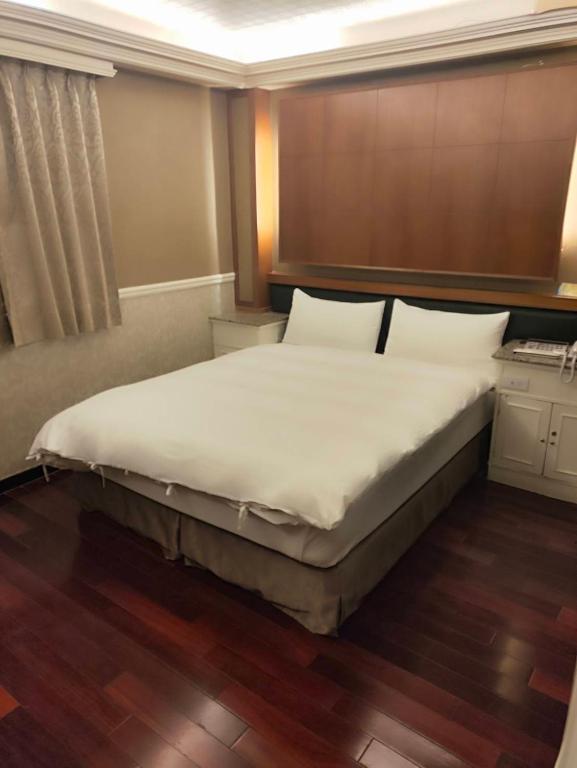 Postel nebo postele na pokoji v ubytování GAWA Hotel
