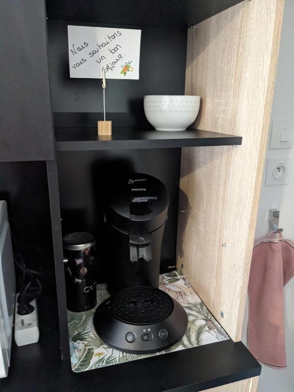 Kuchyňa alebo kuchynka v ubytovaní Joli studio proche des thermes