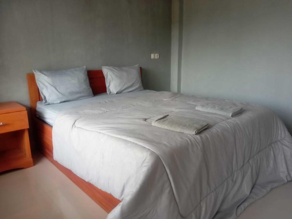 A bed or beds in a room at NURBATA HOLDING'S Hostel