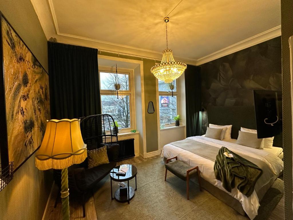 Postel nebo postele na pokoji v ubytování Hotell Onyxen, boutique- & lifestyle, Adults Only