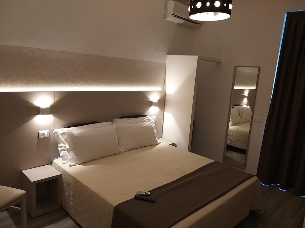 Postel nebo postele na pokoji v ubytování Hotel Ideal