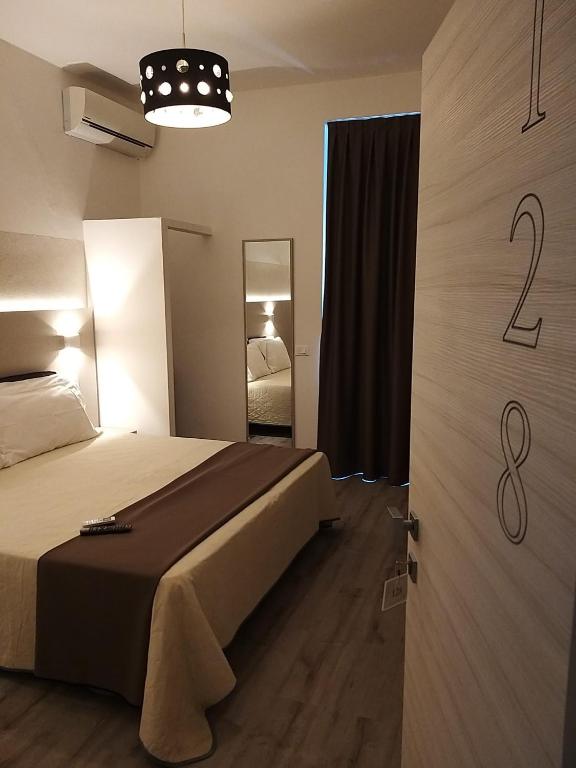 Postel nebo postele na pokoji v ubytování Hotel Ideal