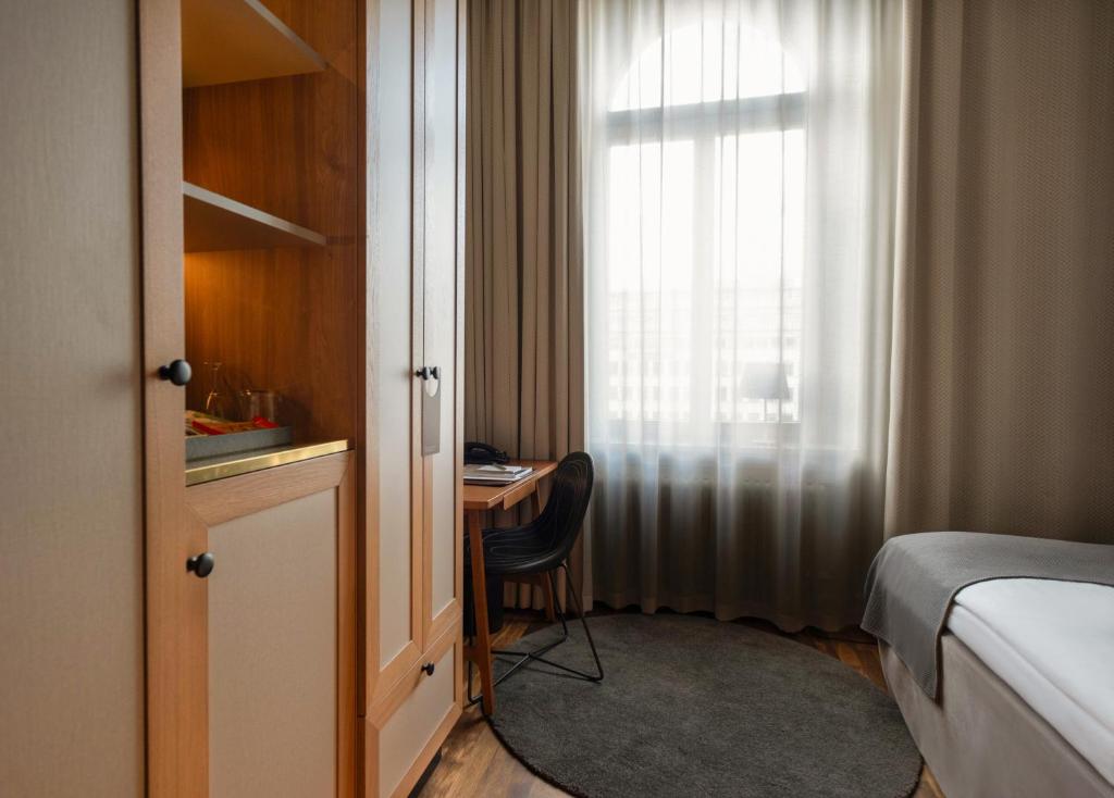 Postel nebo postele na pokoji v ubytování Nobis Hotel Stockholm, a Member of Design Hotels™