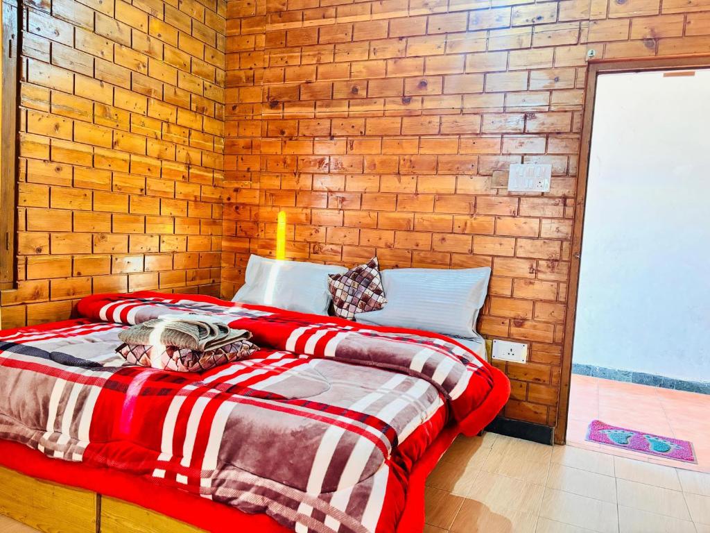 Postel nebo postele na pokoji v ubytování Hotel Himalayan View