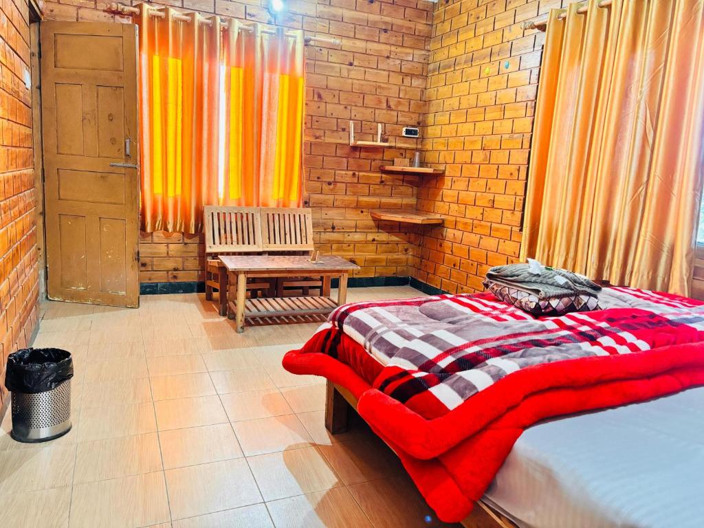 Postel nebo postele na pokoji v ubytování Hotel Himalayan View