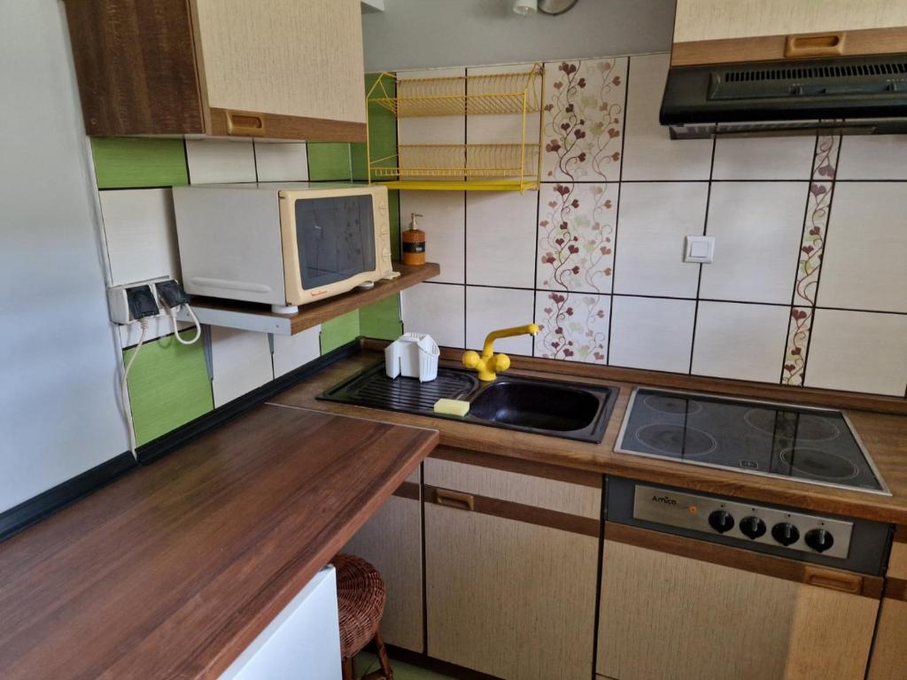 Kuchyňa alebo kuchynka v ubytovaní Drawa Resort