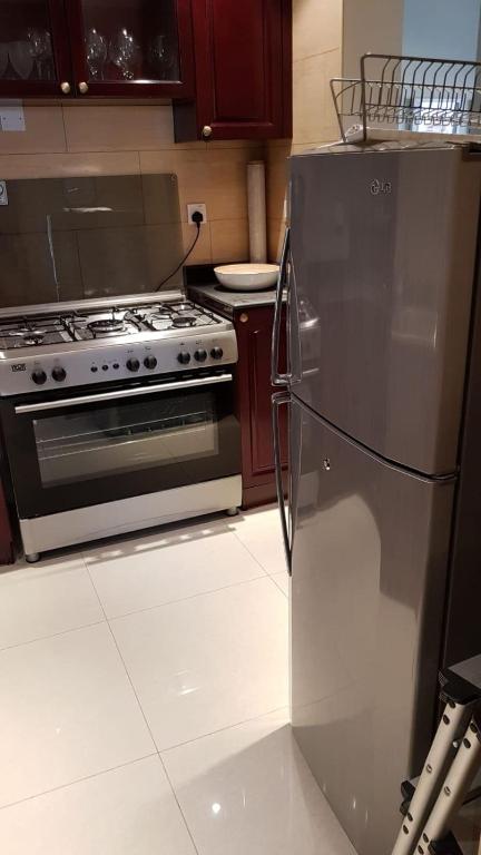 Köök või kööginurk majutusasutuses Big 2br Apartment close to the sea and Golf course