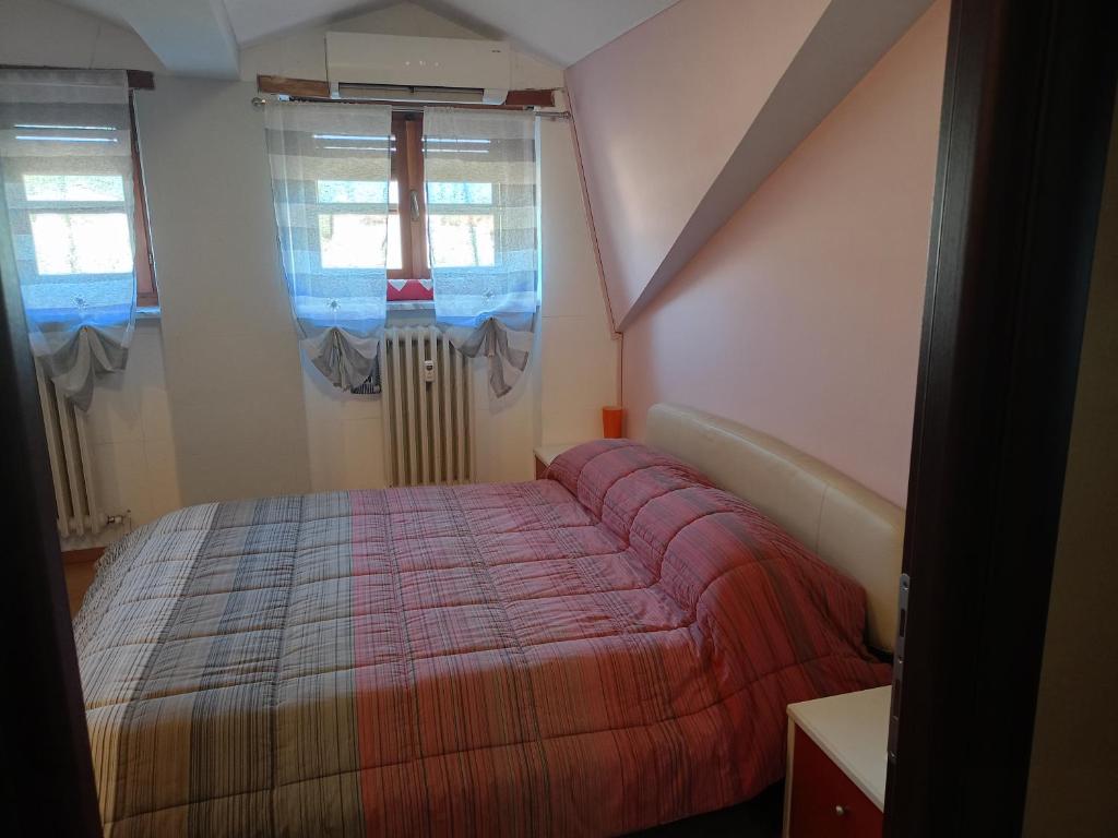 Postel nebo postele na pokoji v ubytování Ale Sweet Home