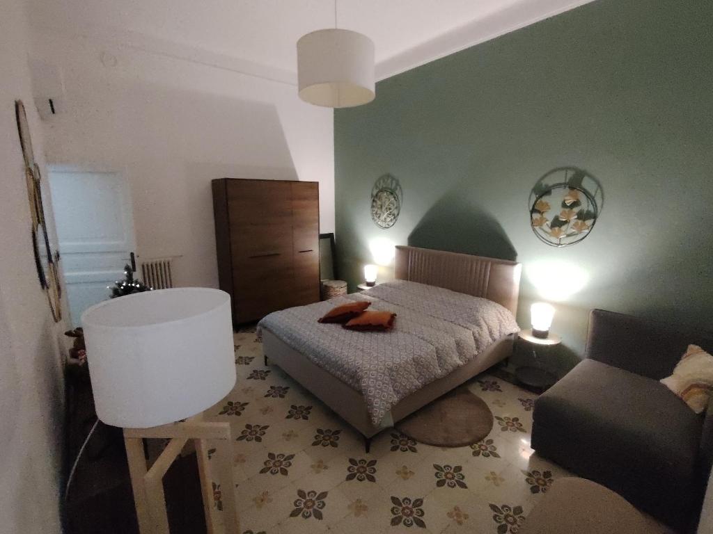 Una cama o camas en una habitación de Vlll PORTICO