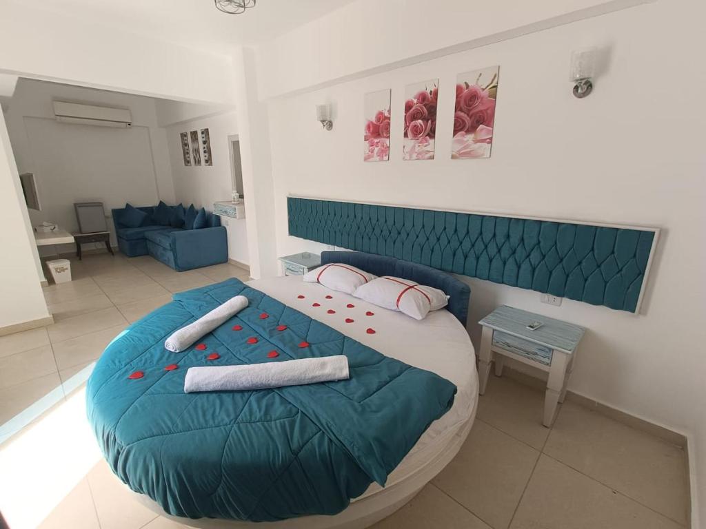 Postel nebo postele na pokoji v ubytování Carmine Hotel Dahab