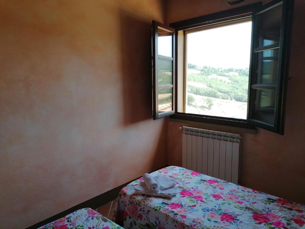 Postel nebo postele na pokoji v ubytování Residence Il Monastero