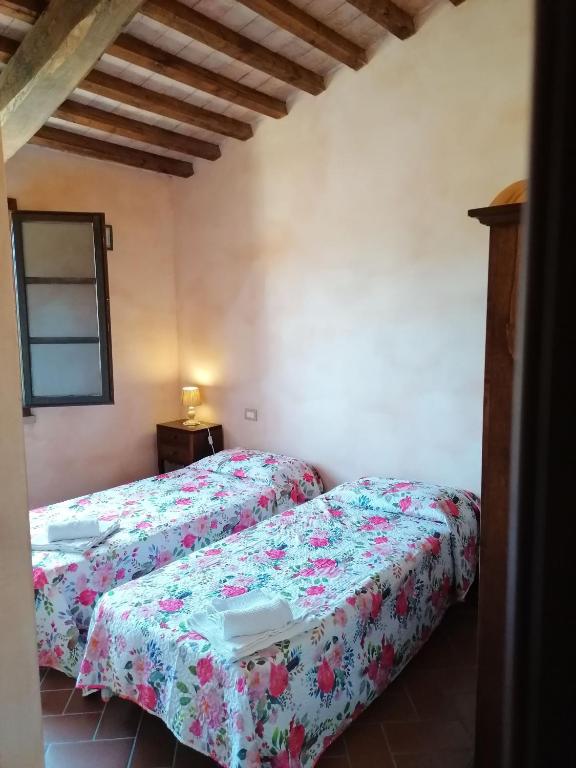 Postel nebo postele na pokoji v ubytování Residence Il Monastero