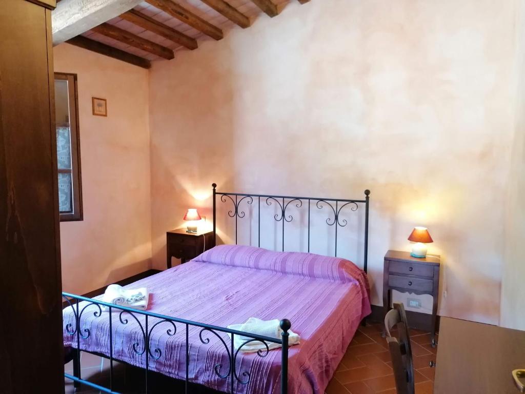 Postel nebo postele na pokoji v ubytování Residence Il Monastero