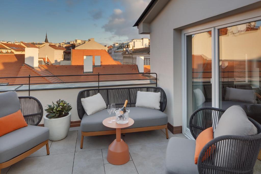 Balkón nebo terasa v ubytování Hotel BOOKQUET