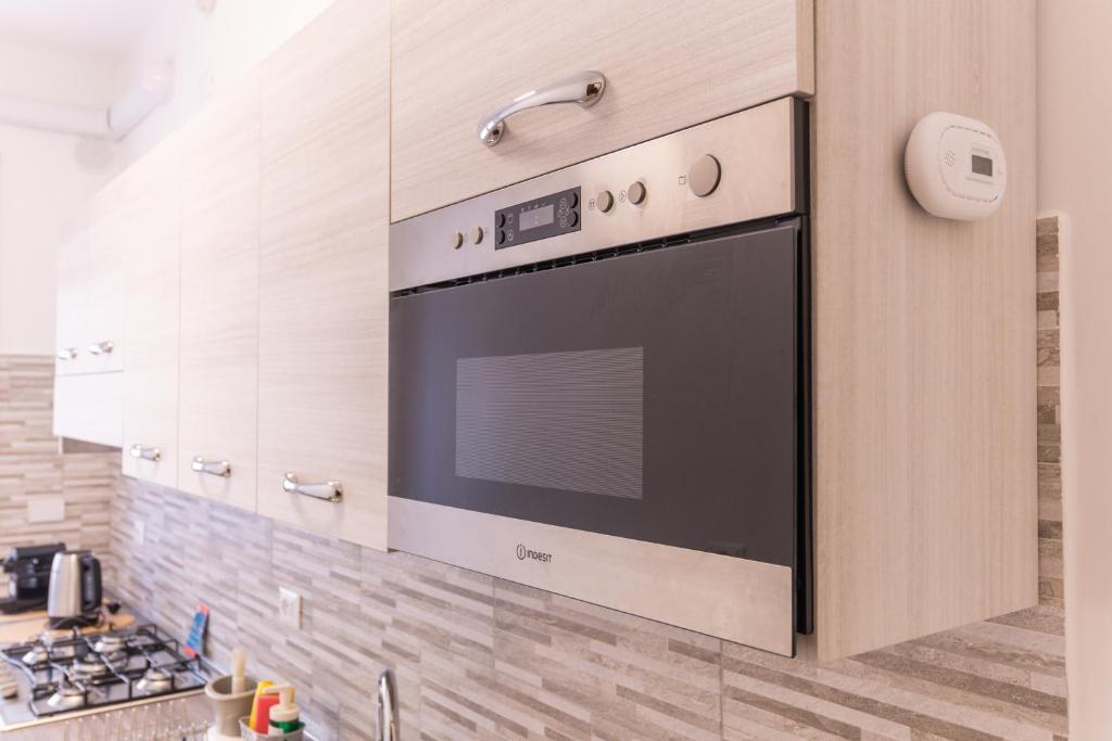 Cucina o angolo cottura di Easy Host Apt Casa Numitore