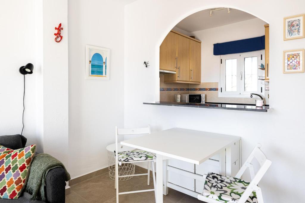 Kuchyňa alebo kuchynka v ubytovaní Cosy apartment in Verano Azul
