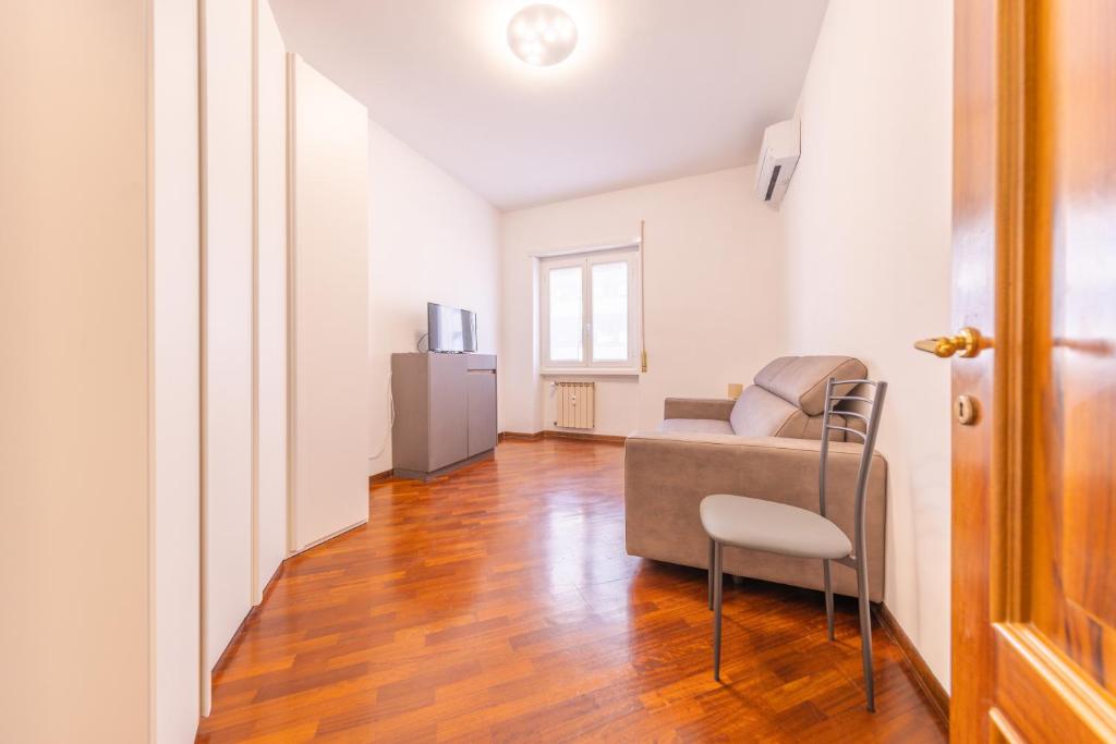 Area soggiorno di Easy Host Apt Casa Numitore