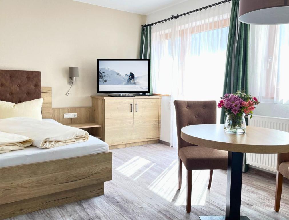 Postel nebo postele na pokoji v ubytování Gästehaus Wöberlerhof