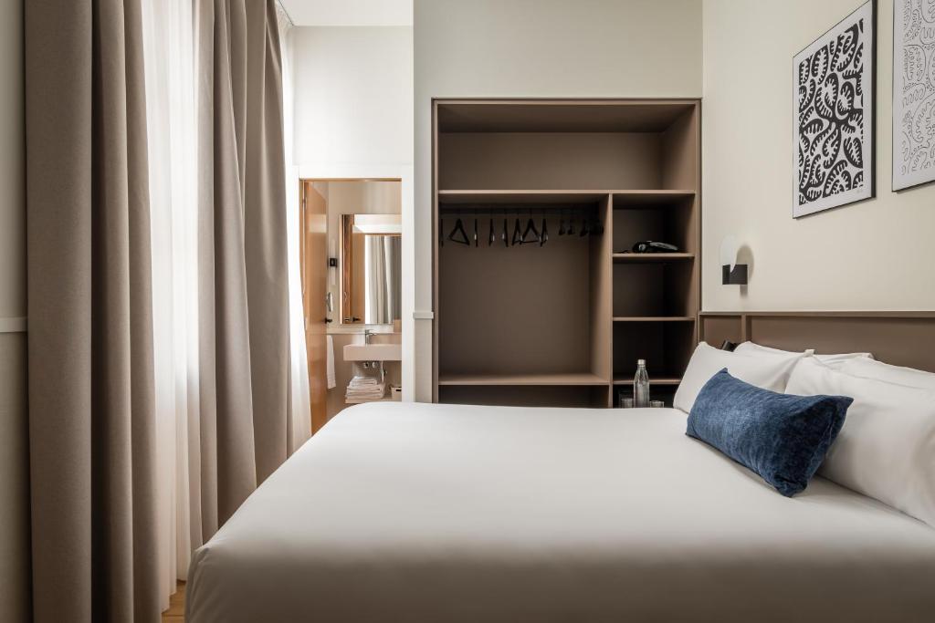 Postel nebo postele na pokoji v ubytování BYPILLOW Sinfonía