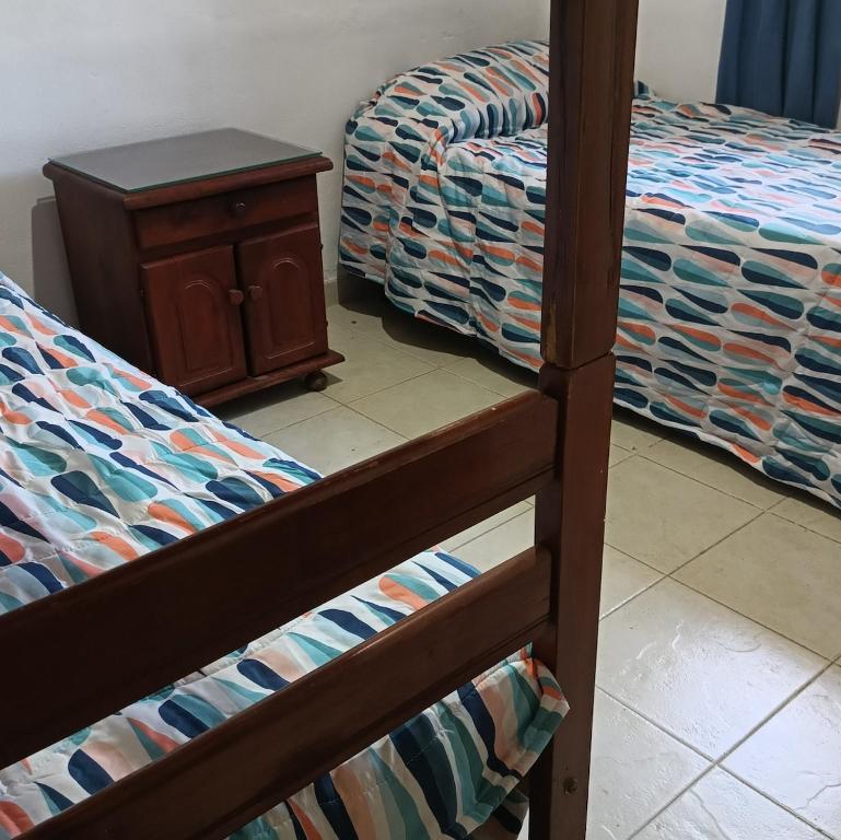 a couple of bunk beds in a room at La Calandria in Villa Serranita