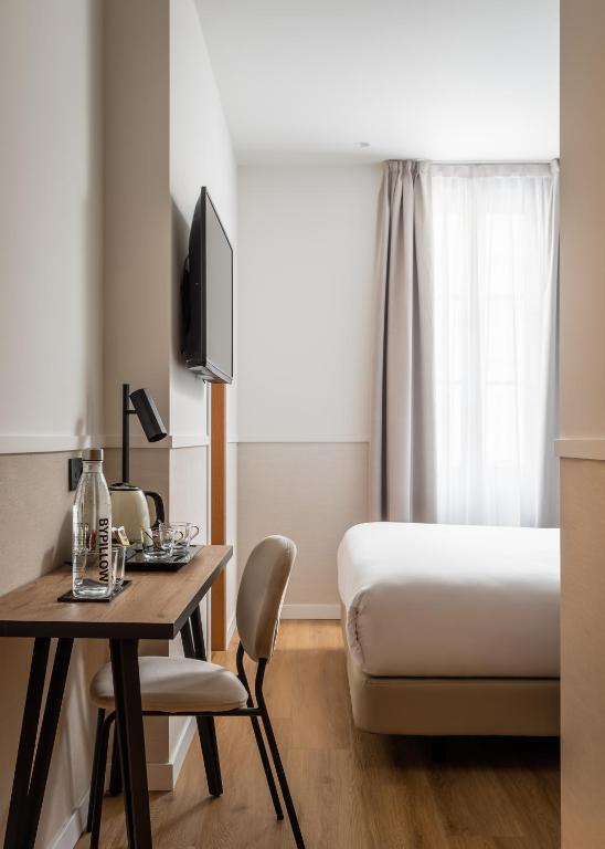 Postel nebo postele na pokoji v ubytování BYPILLOW Sinfonía