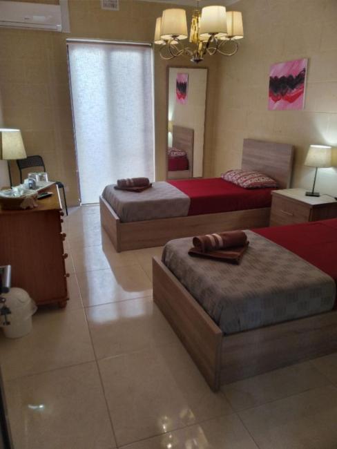 Postel nebo postele na pokoji v ubytování b&b Denis