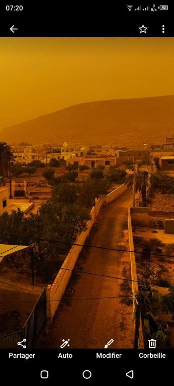 a view of a road in a city with buildings at Elmoubaraka2 in Tataouine