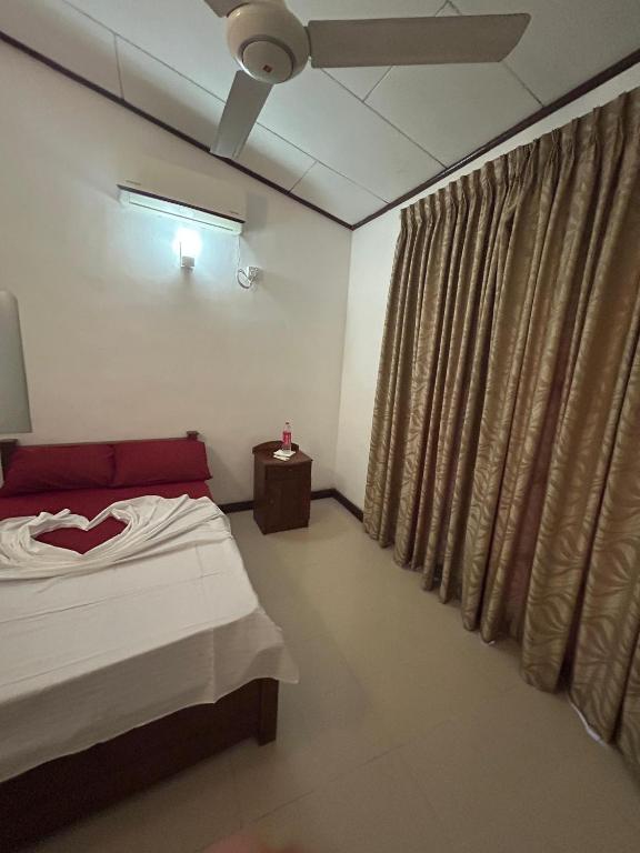 Postel nebo postele na pokoji v ubytování Himo Guest Inn