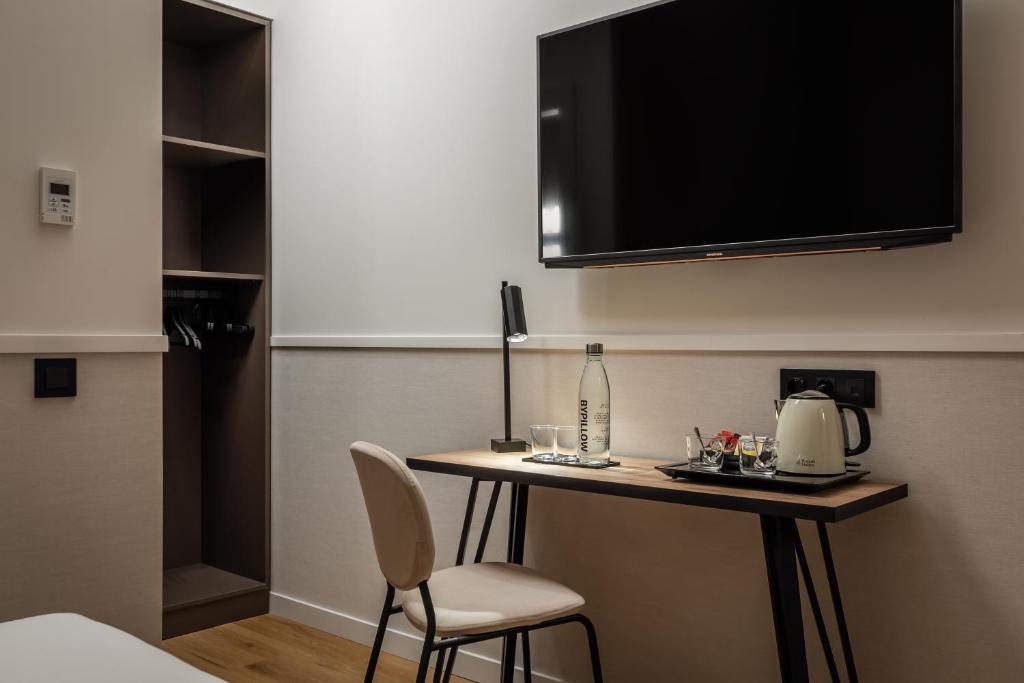TV a/nebo společenská místnost v ubytování BYPILLOW Sinfonía