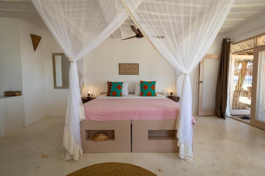 Postel nebo postele na pokoji v ubytování Sharazad Oasis Retreat