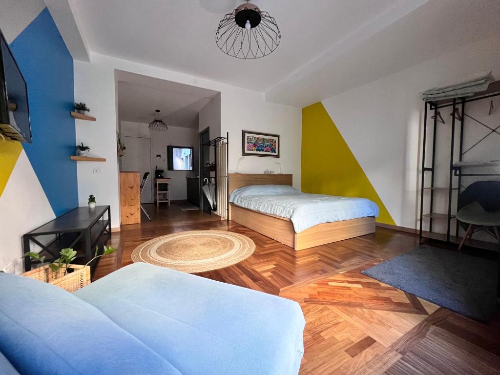 Posteľ alebo postele v izbe v ubytovaní Studio Falconara