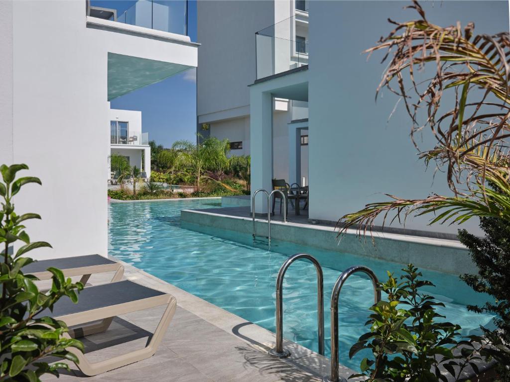 an image of a swimming pool in a building at Atlantica Sungarden Park in Ayia Napa