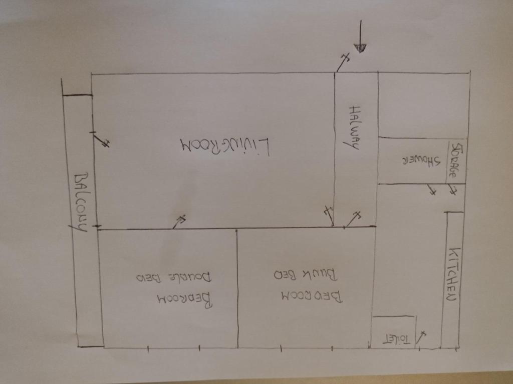 a drawing of a floor plan of a house at Holiday apartement Sentjur in Šentjur