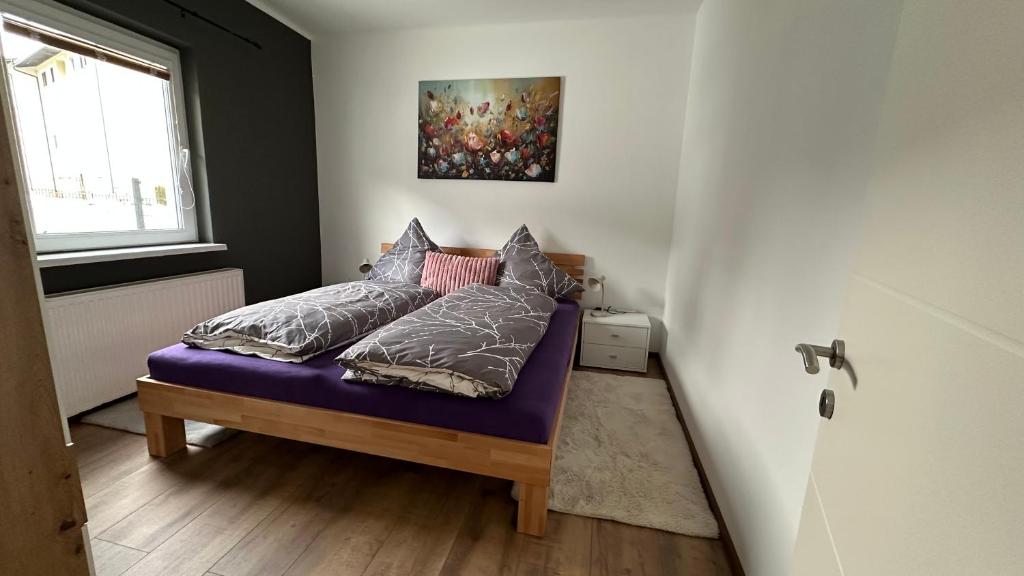 Postel nebo postele na pokoji v ubytování Ferienwohnung Casa Amedea