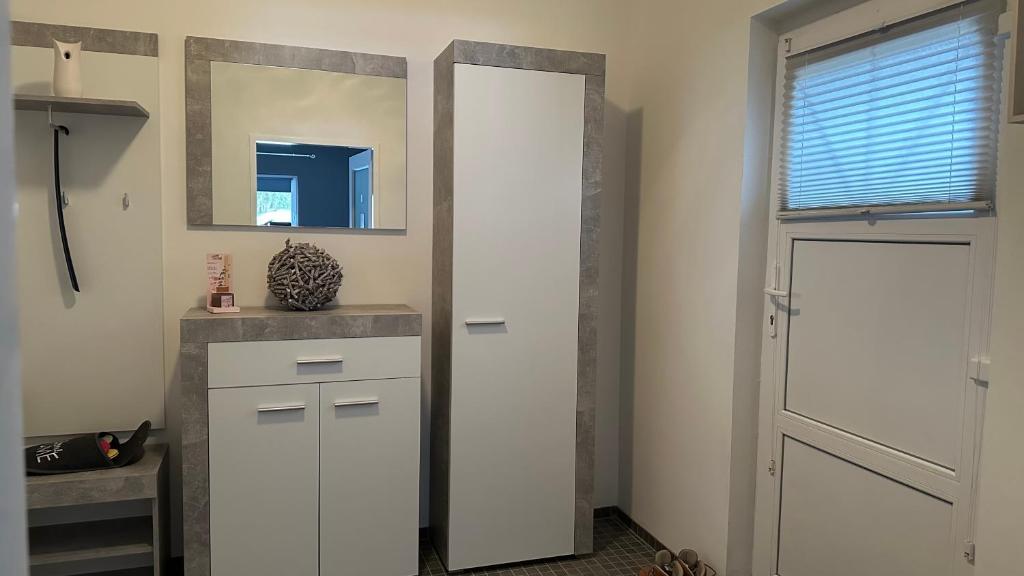 Kuchyň nebo kuchyňský kout v ubytování Ferienwohnung Casa Amedea