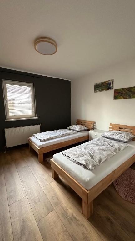 Postel nebo postele na pokoji v ubytování Ferienwohnung Casa Amedea